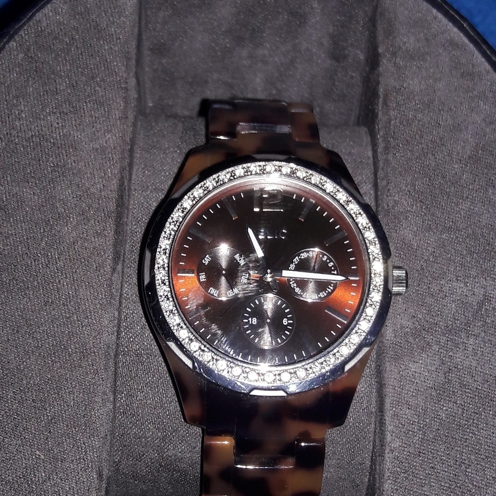 Brown tortious colored watch